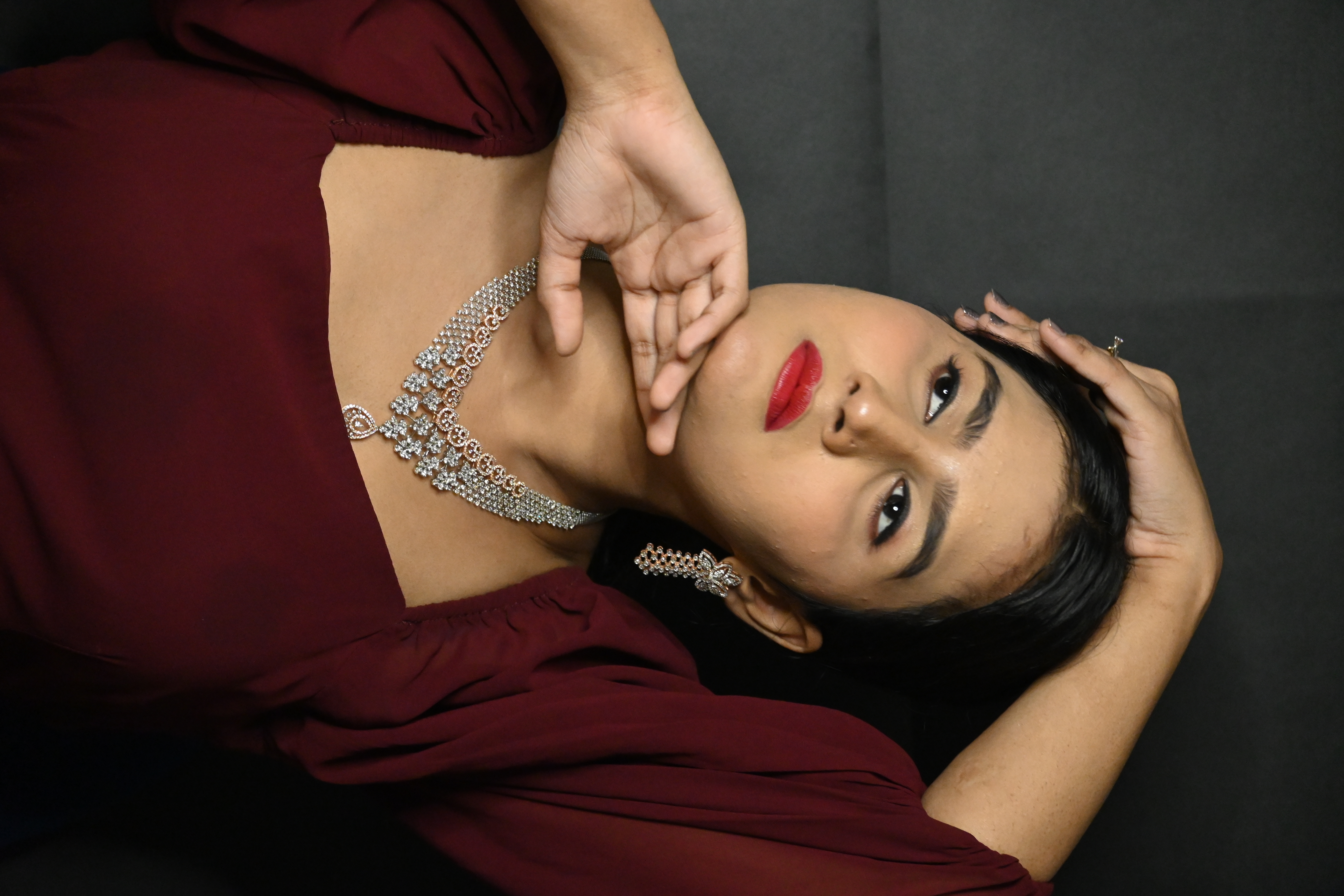 A professional model posing for a portrait.